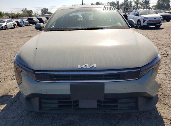 3KPFT4DE7SE201175 2025 KIA K4 Gray Front view