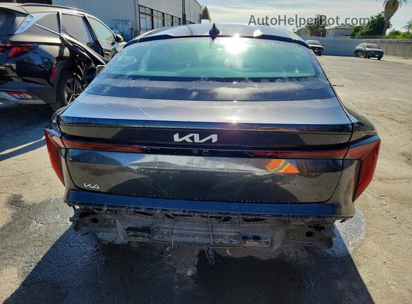 3KPFT4DE9SE228894 2025 KIA K4 Charcoal Widok z tyłu