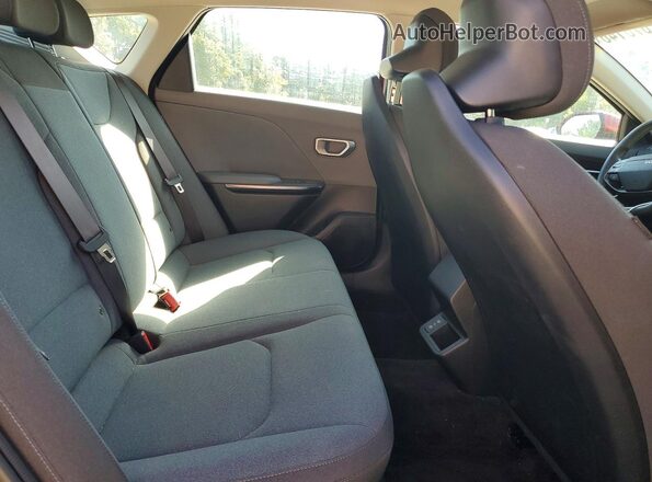 3KPFT4DEXSE006655 2025 KIA K4 Red Rear seats view