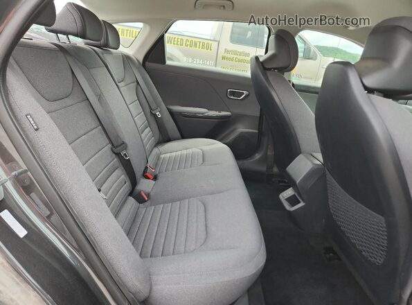 3KPFU4DE0SE072578 2025 KIA K4 Charcoal უკანა სავარძლების ხედი