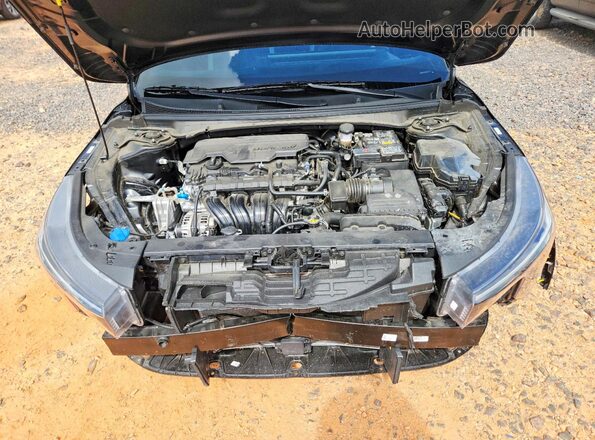 3KPFW4DE2SE055646 2025 KIA K4 Black Vista interior trasera