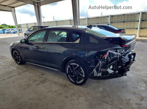 3KPFW4DE2SE073032 2025 KIA K4 Gray Rear left