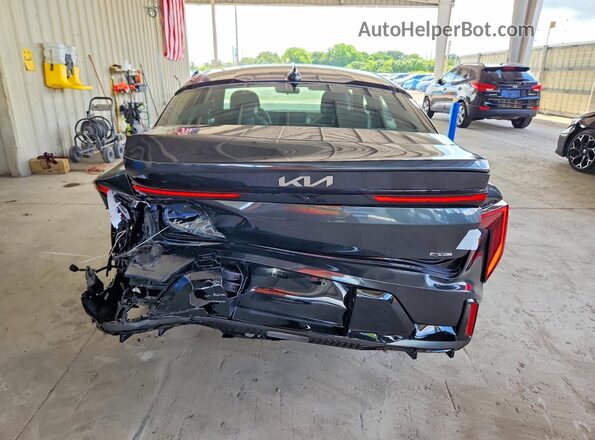3KPFW4DE2SE073032 2025 KIA K4 Gray Rear view