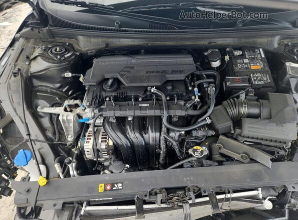 3KPFW4DE4SE167901 2025 KIA K4 Gray Вид задньої частини салону