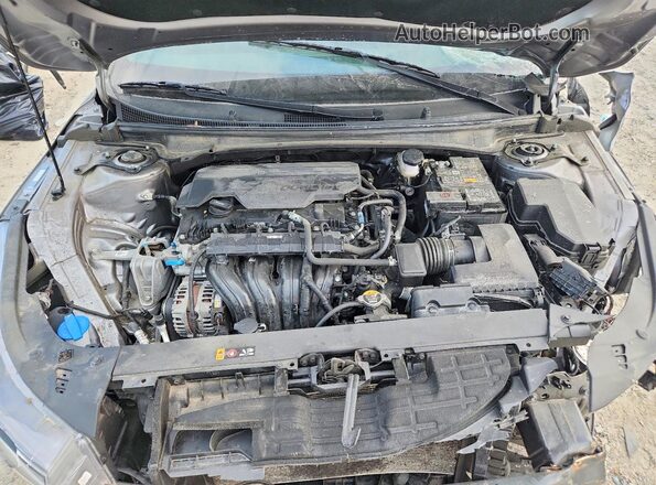 3KPFW4DE7SE038874 2025 KIA K4 Gray Vista interior trasera