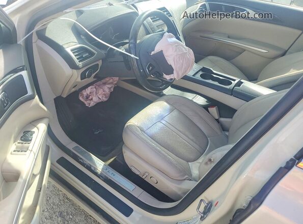 3LN6L2LU7GR632513 2016 LINCOLN MKZ Желто-коричневый Вид панели приборов