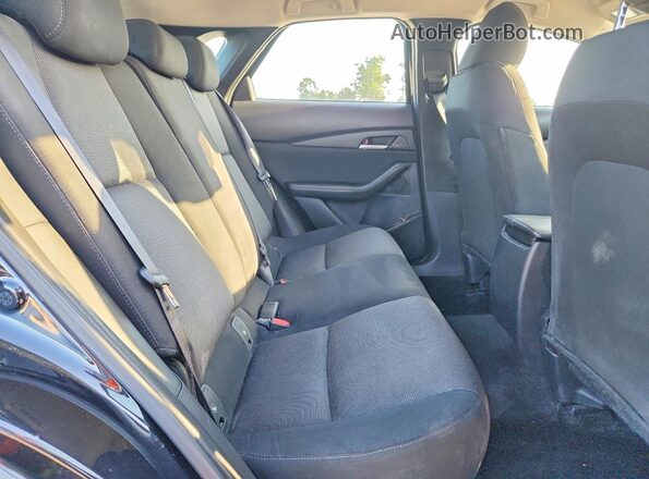 3MVDMBAM1RM640259 2024 MAZDA CX-30 Black Вид задньої частини салону