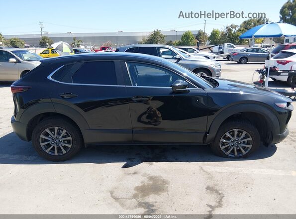 3MVDMBAM3PM555548 2023 MAZDA CX-30 Black Widok wnętrza z tyłu