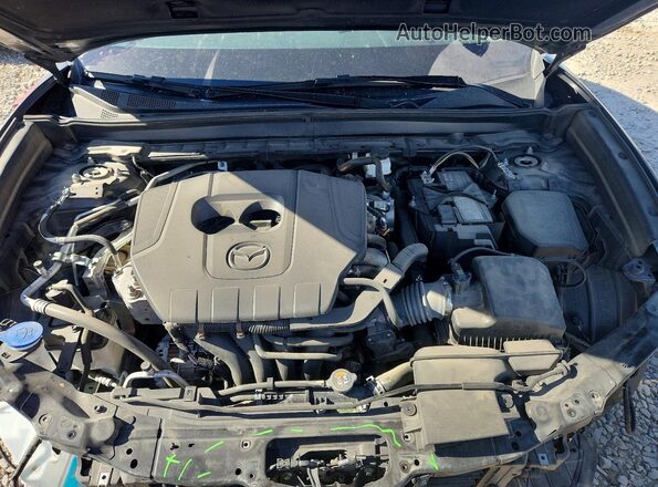 3MVDMBAM8RM666874 2024 MAZDA CX-30 Black Սալոնի հետևի տեսք