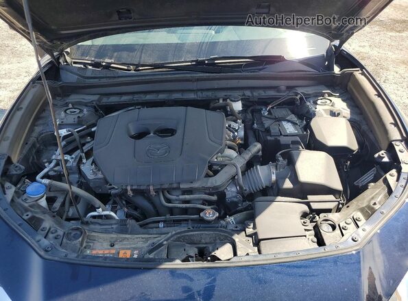 3MVDMBBM7RM669943 2024 MAZDA CX-30 Blue Vista del compartimento del motor