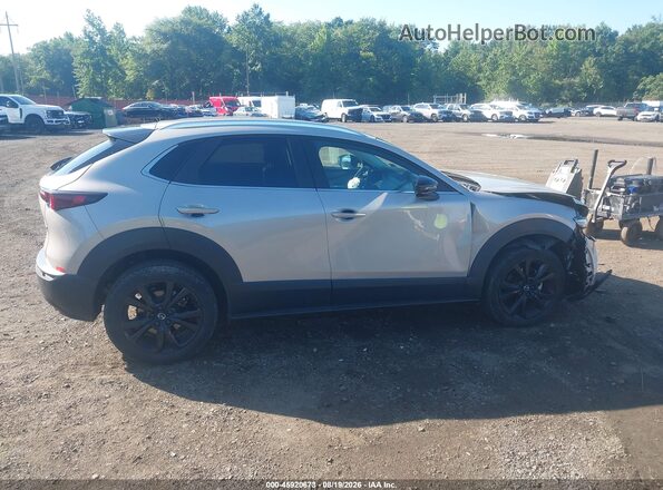 3MVDMBBM8RM700813 2024 MAZDA CX-30 Beige Սալոնի հետևի տեսք