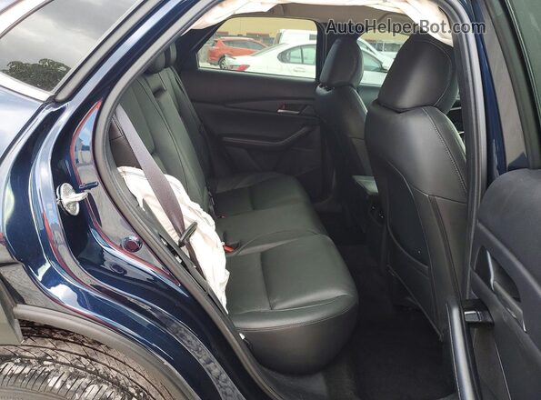 3MVDMBBM9RM677882 2024 MAZDA CX-30 Blue Vista interior trasera