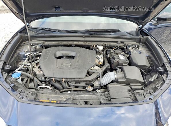 3MVDMBBM9RM677882 2024 MAZDA CX-30 Blue Vista del compartimento del motor