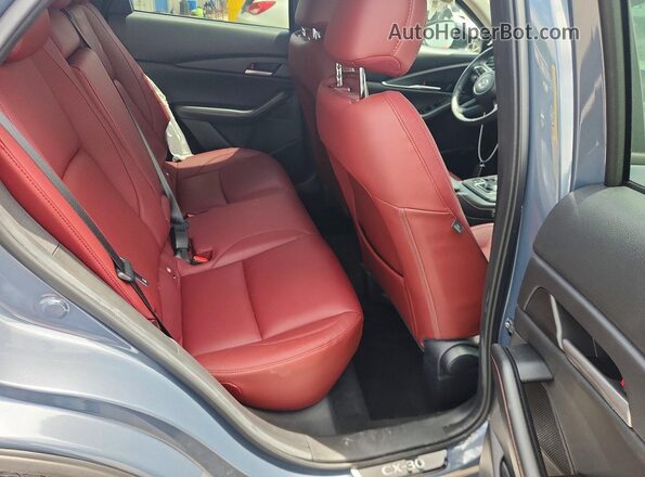 3MVDMBCL8TM102914 2026 MAZDA CX-30 Gray Rear interior view