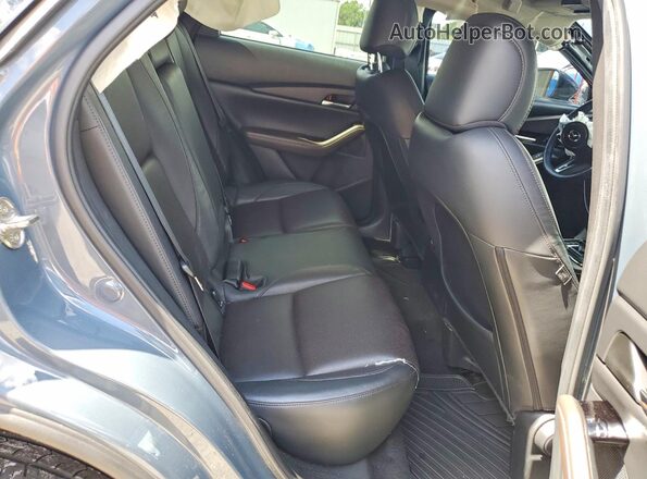 3MVDMBEY0NM432557 2022 MAZDA CX-30 Turquoise Rear interior view