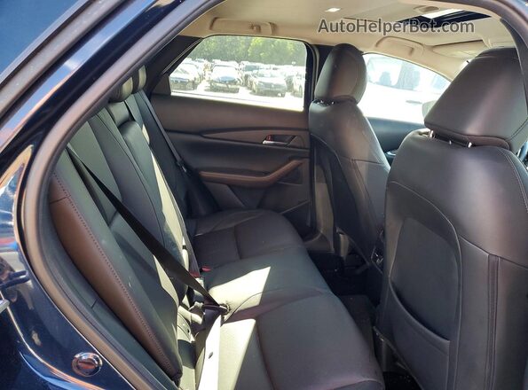 3MVDMBEY7PM509718 2023 MAZDA CX-30 Blue Vista interior trasera