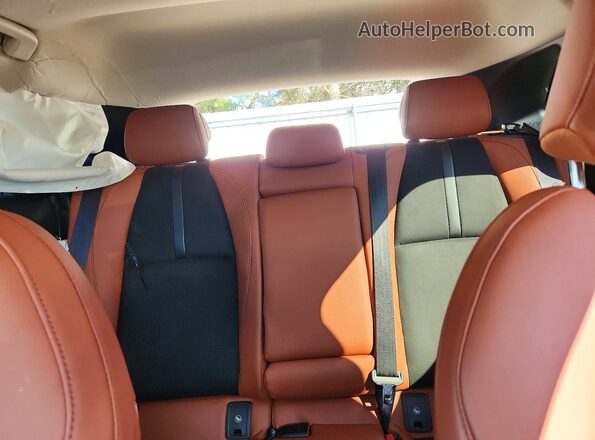 3MVDMBXYXSM817892 2025 MAZDA CX-30 Beige Vista de los asientos traseros