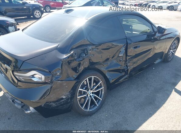 3MW33CM07R8E64418 2024 BMW 2 SERIES Black Դիմացի տեսք