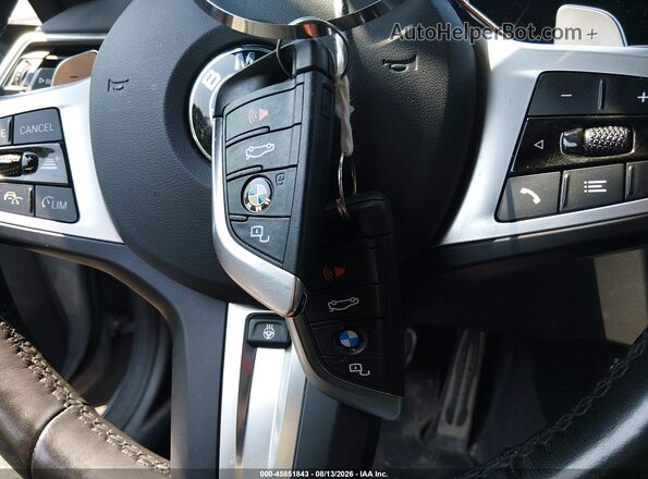 3MW33CM09R8E17634 2024 BMW 2 SERIES Gray Вид панелі приладів
