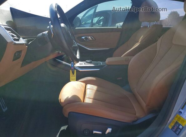 3MW39FF06P8C84003 2023 BMW 3 SERIES Серебряный Вид салона спереди