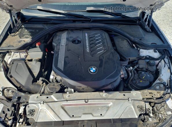 3MW49FF04R8E21818 2024 BMW M3 White Вид задньої частини салону
