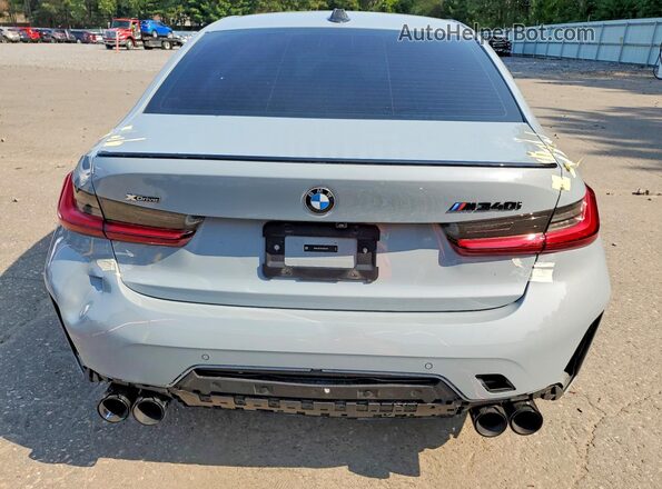 3MW49FF06P8D56595 2023 BMW M3 Серебряный Вид сзади