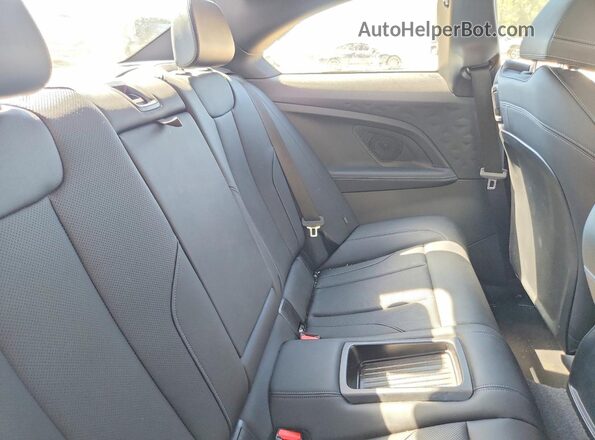 3MW53CM03R8E11692 2024 BMW M2 Red უკანა სავარძლების ხედი