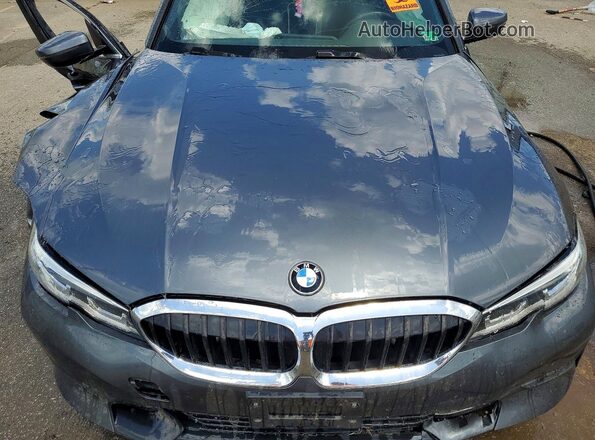 3MW5P7J0XM8B77902 2021 BMW 3 SERIES Charcoal Widok wnętrza z tyłu