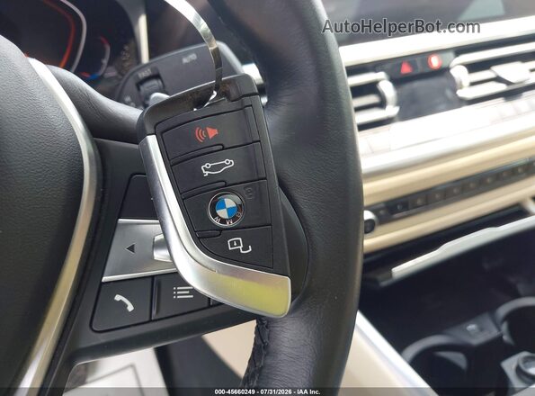 3MW5R7J03M8B90596 2021 BMW 3 SERIES Black Widok deski rozdzielczej