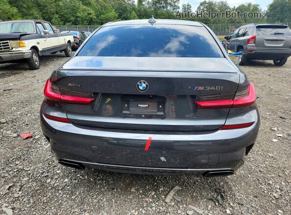 3MW5U9J05N8C61664 2022 BMW M3 Gray Հետևի տեսք