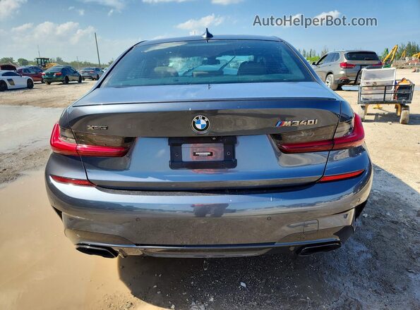 3MW5U9J07N8C62864 2022 BMW M3 Синий Вид сзади
