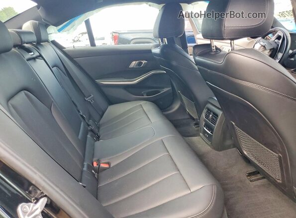3MW69FF01P8D02372 2023 BMW 3 SERIES Black Rear seats view