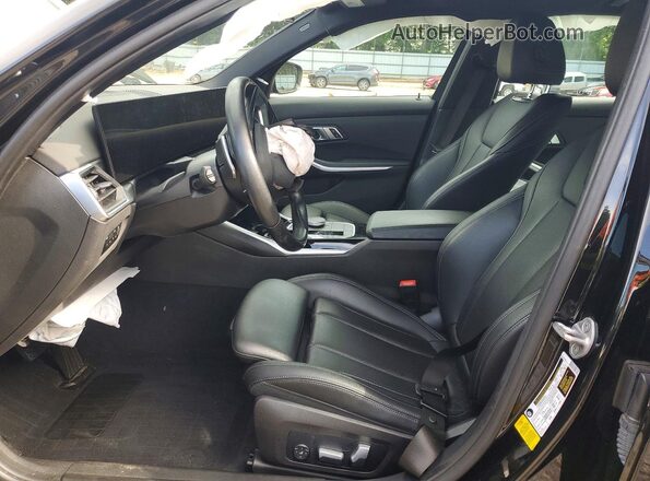 3MW69FF01P8D02372 2023 BMW 3 SERIES Black Front interior view