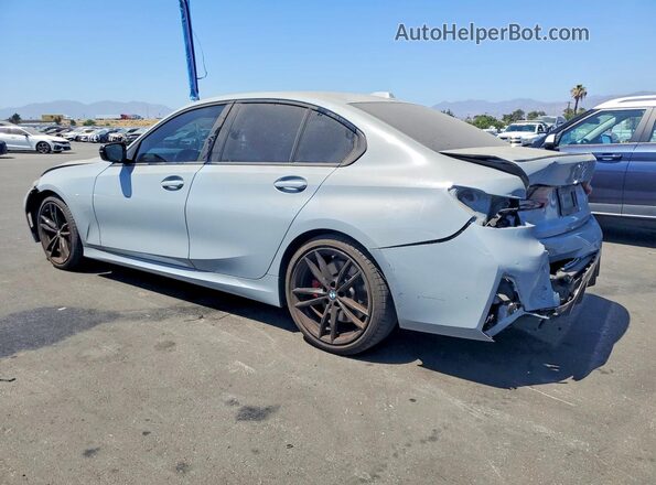 3MW69FF08P8D74606 2023 BMW 3 SERIES Gray Tył lewy