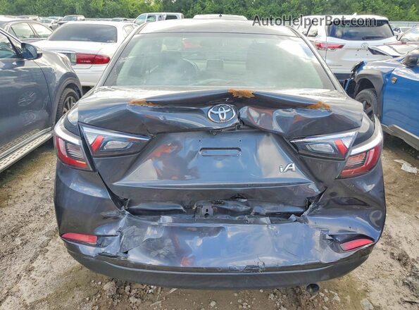 3MYDLBYV1HY196277 2017 TOYOTA YARIS Gray უკანა ხედი