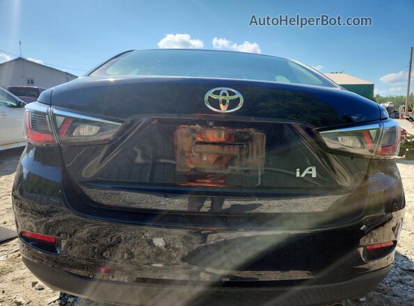 3MYDLBYV2HY167824 2017 TOYOTA YARIS Black Vista trasera