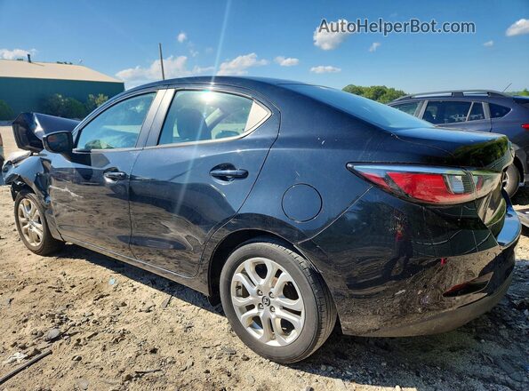 3MYDLBYV2HY167824 2017 TOYOTA YARIS Black Trasero izquierdo