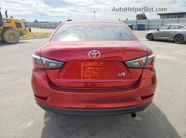 3MYDLBYV2JY320112 2018 TOYOTA YARIS Red Rear view