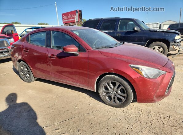 3MYDLBYV2KY502636 2019 TOYOTA YARIS Бордовый Передняя правая четверть