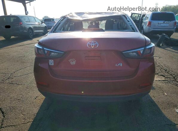 3MYDLBYV6HY149326 2017 TOYOTA YARIS Maroon Rear view