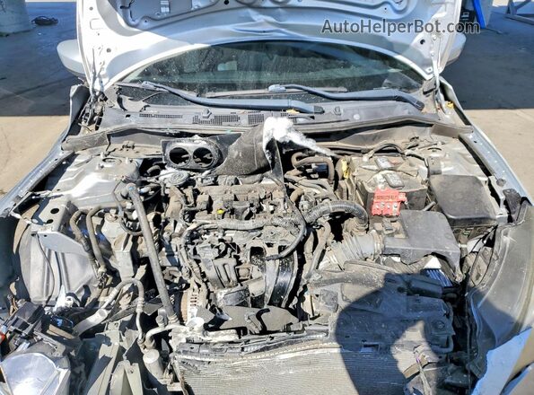 3MYDLBYV6JY322302 2018 TOYOTA YARIS Silver Вид задньої частини салону