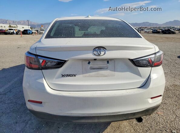 3MYDLBYV6KY503322 2019 TOYOTA YARIS White Vista interior trasera