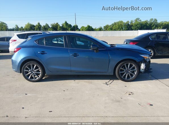 3MZBN1L38JM269686 2018 MAZDA 3 Light Blue Սալոնի հետևի տեսք