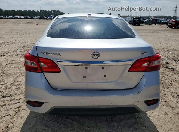 3N1AB7AP0GY245807 2016 NISSAN SENTRA Silver Вид ззаду