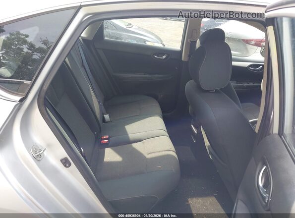 3N1AB7AP0GY323017 2016 NISSAN SENTRA Silver Vista de la etiqueta del VIN