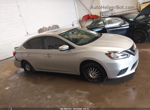 3N1AB7AP0GY325365 2016 NISSAN SENTRA Silver Rear interior view