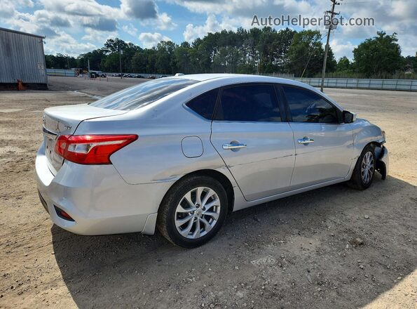3N1AB7AP0JL624195 2018 NISSAN SENTRA Серебряный Задняя правая четверть