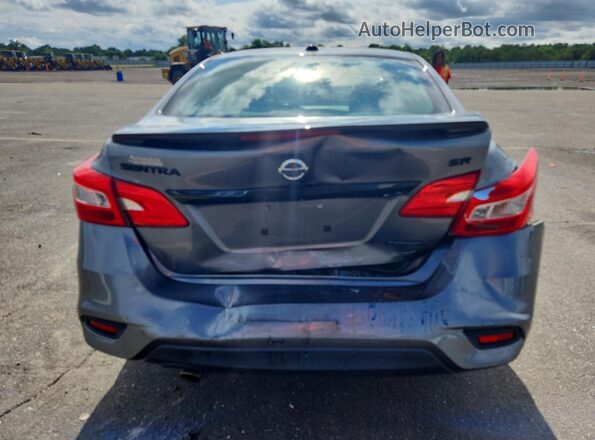 3N1AB7AP0JY272299 2018 NISSAN SENTRA Серый Вид сзади