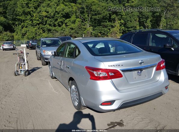 3N1AB7AP0KY234489 2019 NISSAN SENTRA Серебряный Задняя левая четверть