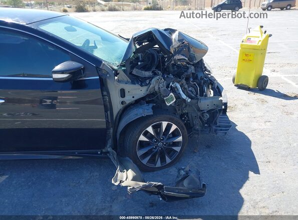 3N1AB7AP1GY213674 2016 NISSAN SENTRA Black Սալոնի հետևի տեսք